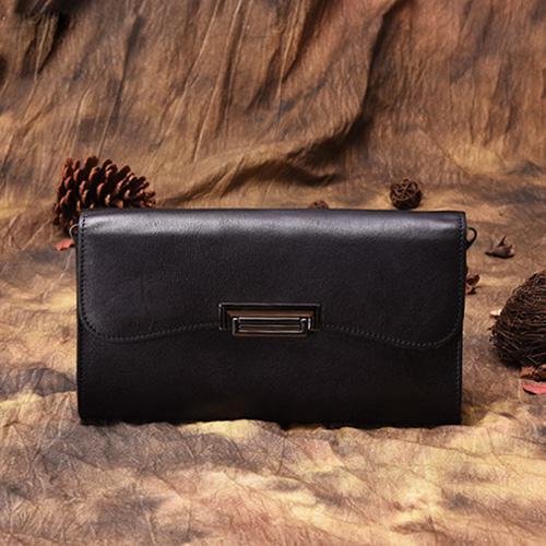 Side outlet clutch bag