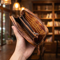 Dark brown distressed leather clutch wallet with leather wristlet strap