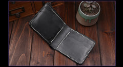 Interior of hand carved koi wallet with dark blue leather lining and card slots