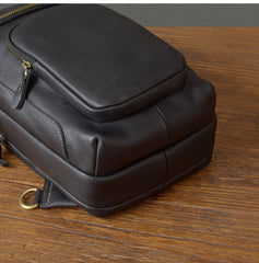 Large leather sling backpack - antique brass hardware and zipper pull detail