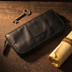 Vintage distressed leather long wallet front with embossed logo patch, mustard tan