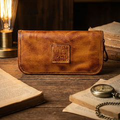 Open vintage zip clutch showing dual-side card slots and center zip pocket