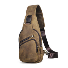 Khaki leather sling chest bag with buckled shoulder strap