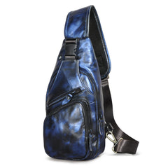 Blue mottled leather sling chest bag, studio shot