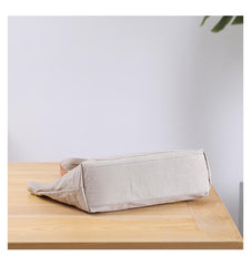 bottom of canvas crossbody tote