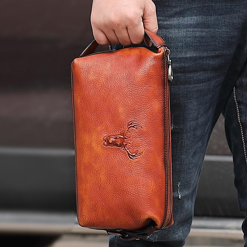 Leather clutch bag men sales